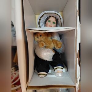 Porcelain Doll with Plush Bear